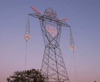 Illustration for article titled These Beautiful Giant Sculptures Support Power Lines With Style